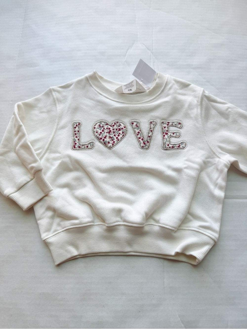 Girls New Sweatshirt in Cream with Love in pretty floral Print Size 2T
NWT